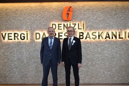 Kaymakamımız Sayın Abdullah Demir, Vergi Dairesi Başkanı Halil Tekin'i ziyaret ederek vergi haftasını kutladı.